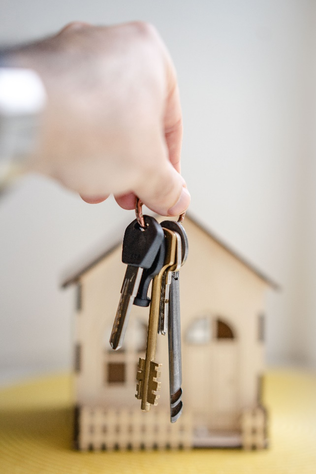 a person with keys for real estate